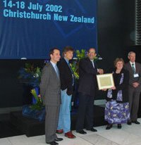Erick Carreira receiving his award